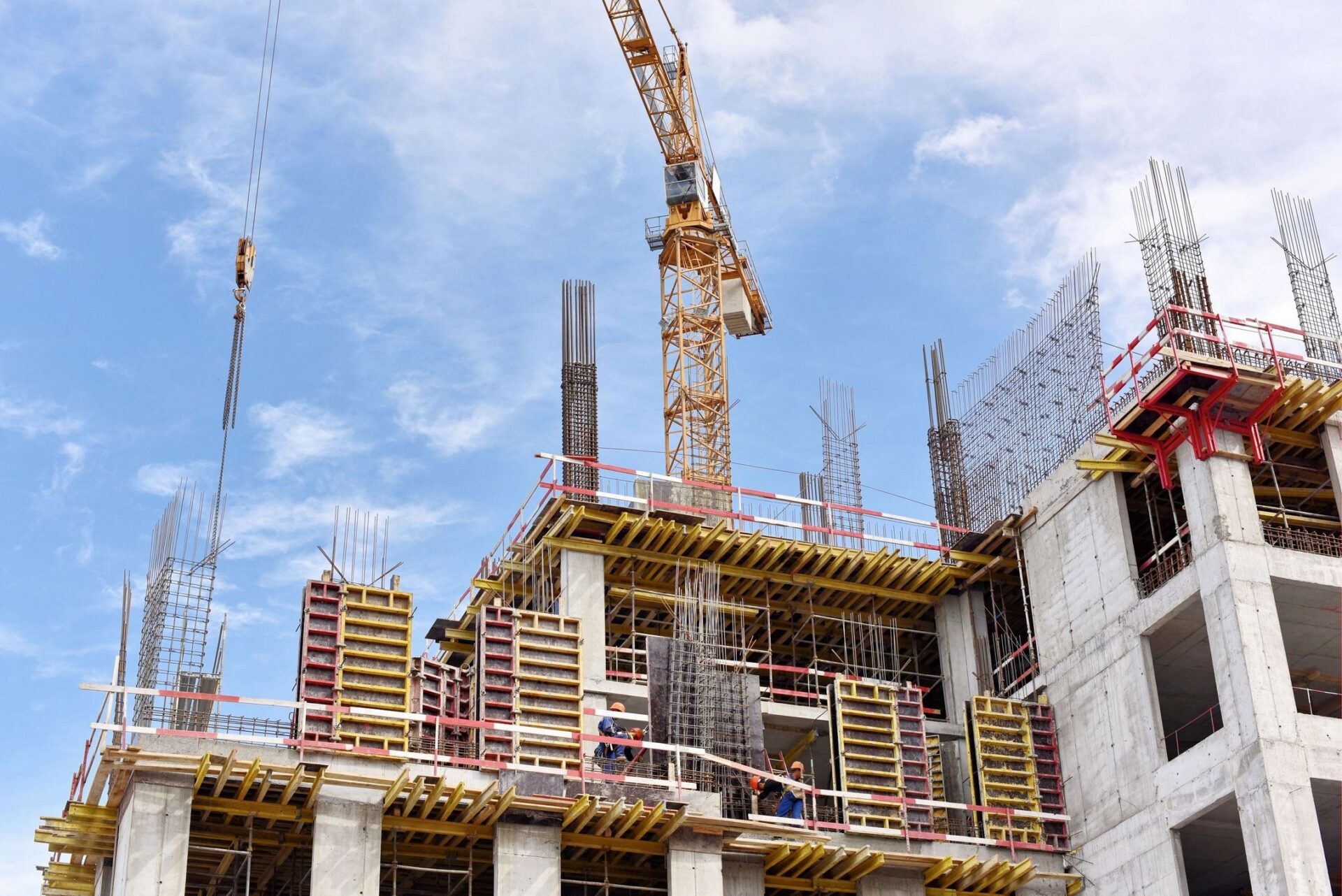 A new building is being constructed with use of tower crane